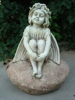 STATUE FAIRY SITTING ON ROCK