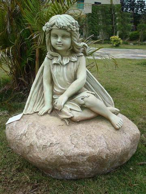 STATUE FAIRY LEANING ON ROCK