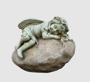 FAIRY RESTING ON ROCK 